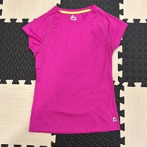 RBX fuchsia workout top in size medium